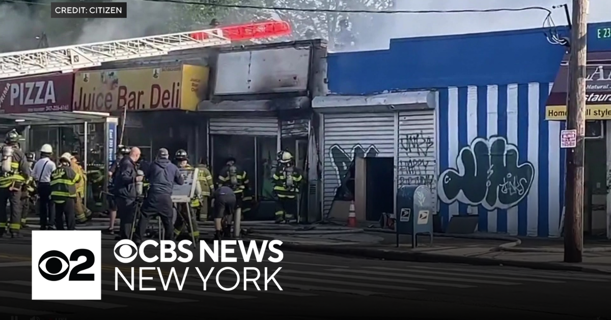 Fire moves through multiple businesses in the Bronx - CBS New York