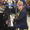 Elton John's gift brings star-studded performances to London train station