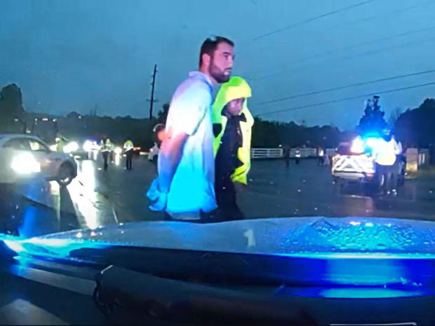 Scottie Scheffler is seen after he was arrested near Valhalla Golf Club in Louisville, Kentucky, May 17, 2024, in an image capture from dashcam video. 