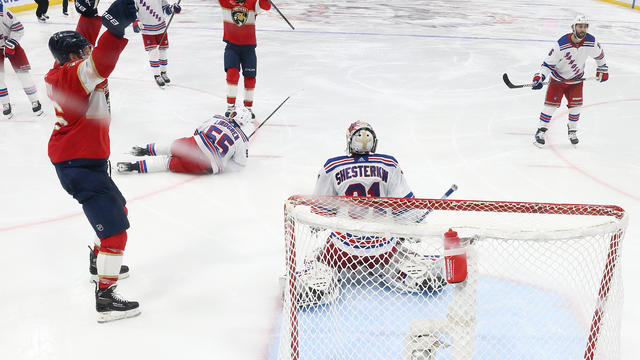 Sam Reinhart #13 of the Florida Panthers celebrates after scoring a goal the gamewinning goal in overtime past Igor Shesterkin #31 of the New York Rangers in Game Four of the Eastern Conference Final of the 2024 Stanley Cup Playoffs at Amerant Bank Arena on May 28, 2024 in Sunrise, Florida. 