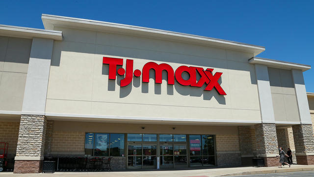 Shoppers are seen approaching a TJ Maxx discount retail 
