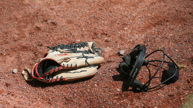 glove-and-mask-in-the-dirt.jpg 