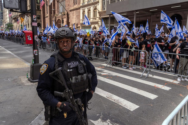 NYPD Emergency Service Unit patrol with rifles at the the Israel Day on Fifth parade on June 2, 2024 in New York City. 