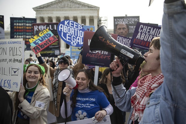People gather to rally on broad access to the abortion pill outside the U.S. Supreme Court on March 26, 2024.