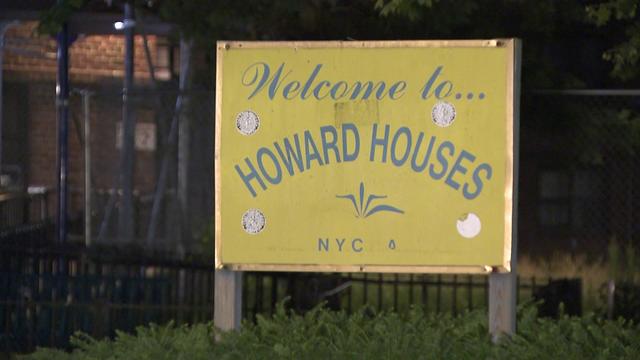A sign reading "welcome to Howard Houses" 