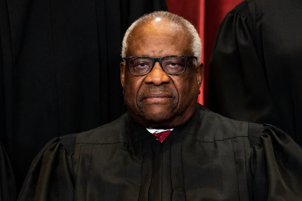 Justice Clarence Thomas is seen during a group photo of the justices of the Supreme Court in Washington, April 23, 2021.