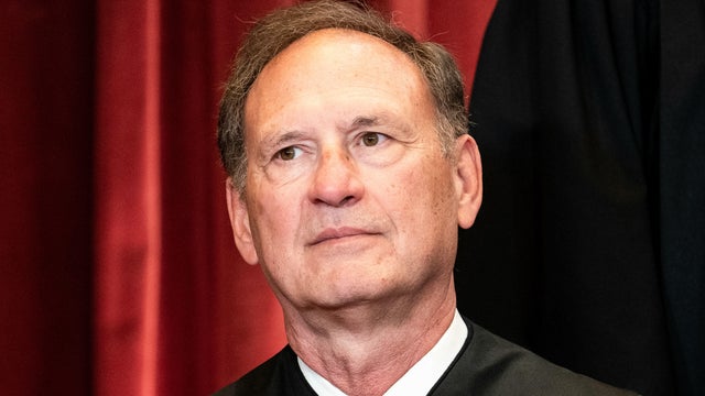 Justice Samuel Alito sits during a group photo of the justices of the Supreme Court in Washington, April 23, 2021. 