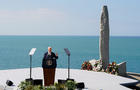U.S. President Joe Biden delivers remarks at the World War II Pointe du Hoc Ranger Monument, in Cricqueville-en-Bessin 
