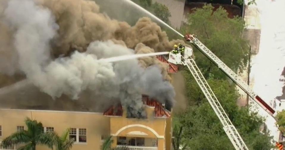 Massive fire at Miami apartment building where a man was found shot ...