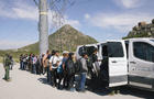 Migrants are processed by Border Patrol agents after crossing the U.S.-Mexico border on June 9, 2024, in Jacumba Hot Springs, California. 