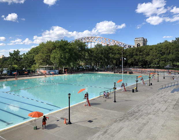 Lifeguards getting ready at Astoria Pool in Astoria Park, Queens, New York 