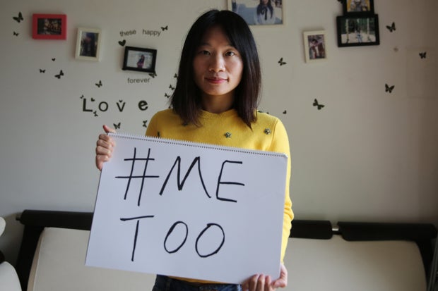 Sophia Huang Xueqin, a freelance journalist who wants to raise people's awareness about sexual harassment in China, poses with a #MeToo sign in her home. 08DEC17 SCMP/Thomas Yau