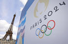 Paris 2024 Olympics logo with the Eiffel Tower in the background 