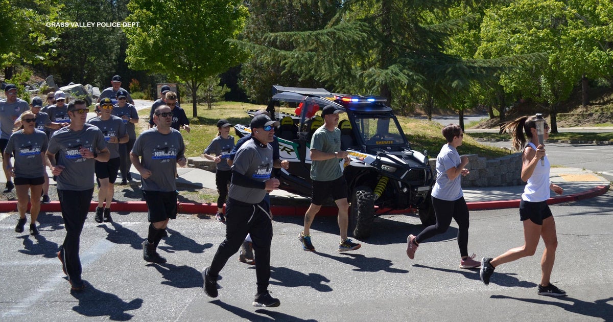 Grass Valley police carry the torch in honor of the Special Olympics