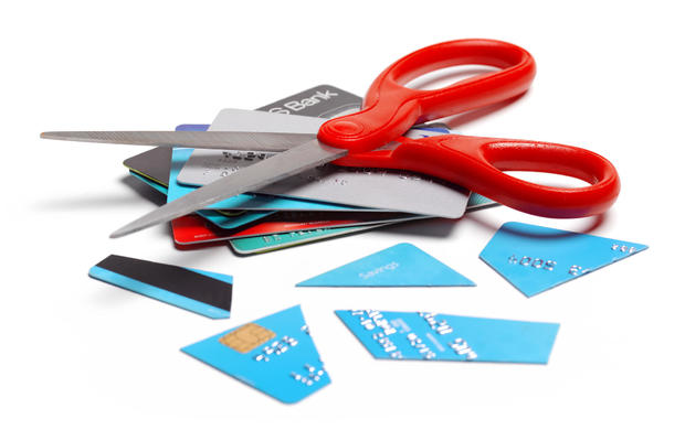 In debt, cut up credit card 