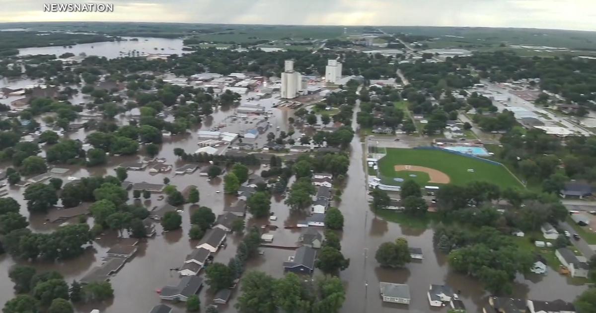 Iowa residents survey damage amid catastrophic flooding