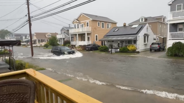 Car driving through flooding in Margate, New Jersey 