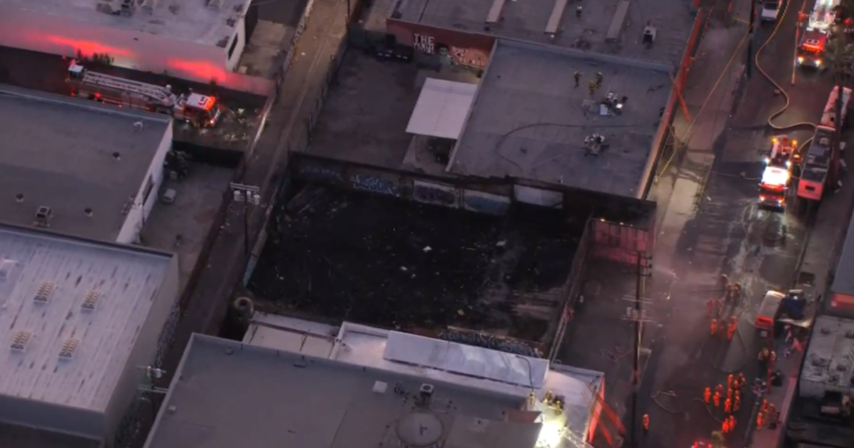Major fire engulfs commercial building in Downtown LA before being extinguished by firefighters