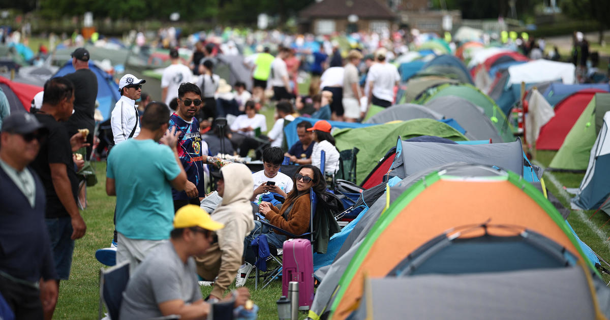 Meet the diehard tennis fans camped out in Wimbledon's epic "queue"