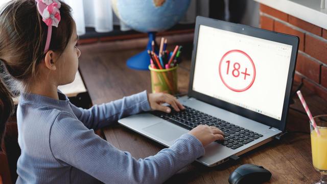 Child Girl Using Computer Ended Up 18+ Web Page On Internet, Parental Control Concept 