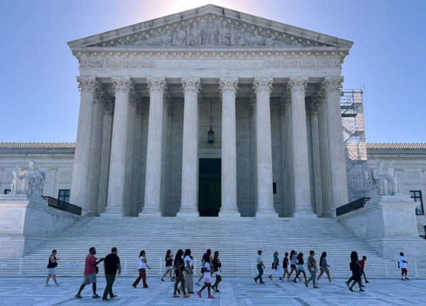 Tourists gather outside the U.S. Supreme Court on June 7, 2024, in Washington, D.C. 