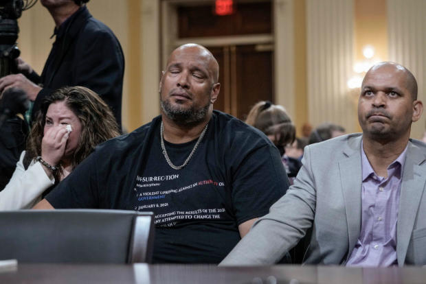 U.S. Capitol Police Officer Harry Dunn, left, and Sgt. Aquilino Gonell listen during a hearing of the House Jan. 6 committee on June 9, 2022. 