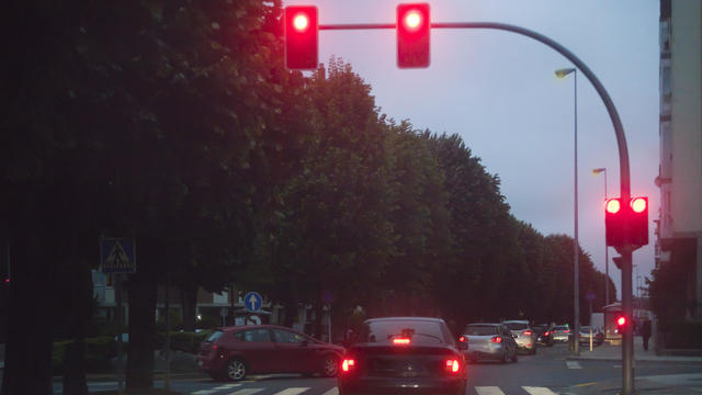 Street view , red traffic lights, city life. 