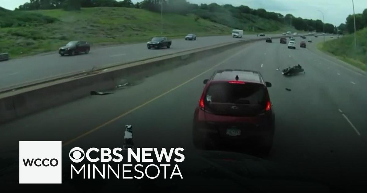 Dash cam footage shows close call between motorcyclist and dump truck – CBS News