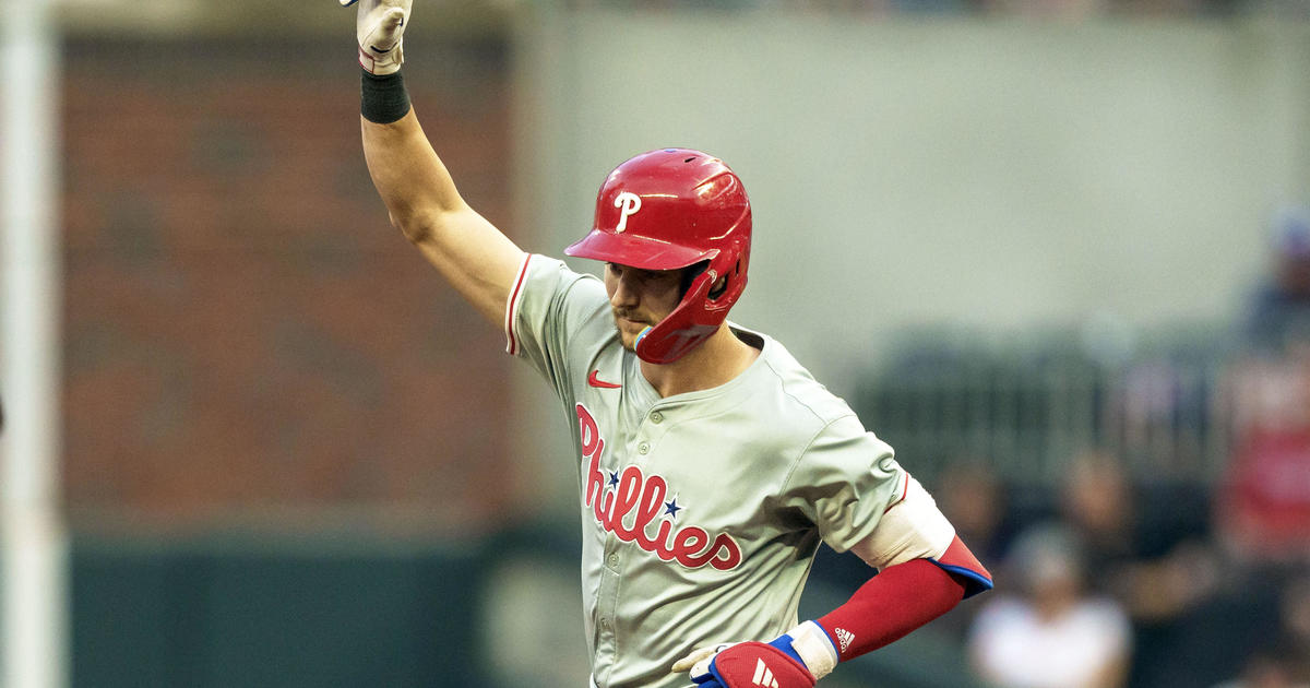 Trea Turner hits two 2-run homers, Aaron Nola earns 100th career win in Phillies’ 8-6 victory over Braves