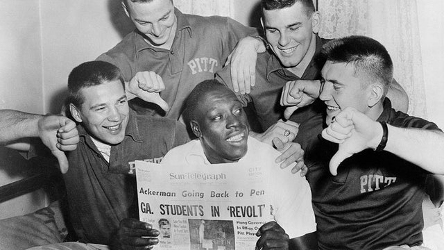 Bobby Grier Holding Newspaper on His Team's Protests 