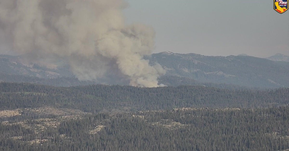 Crews battling fire seen from I-80 in Tahoe National Forest