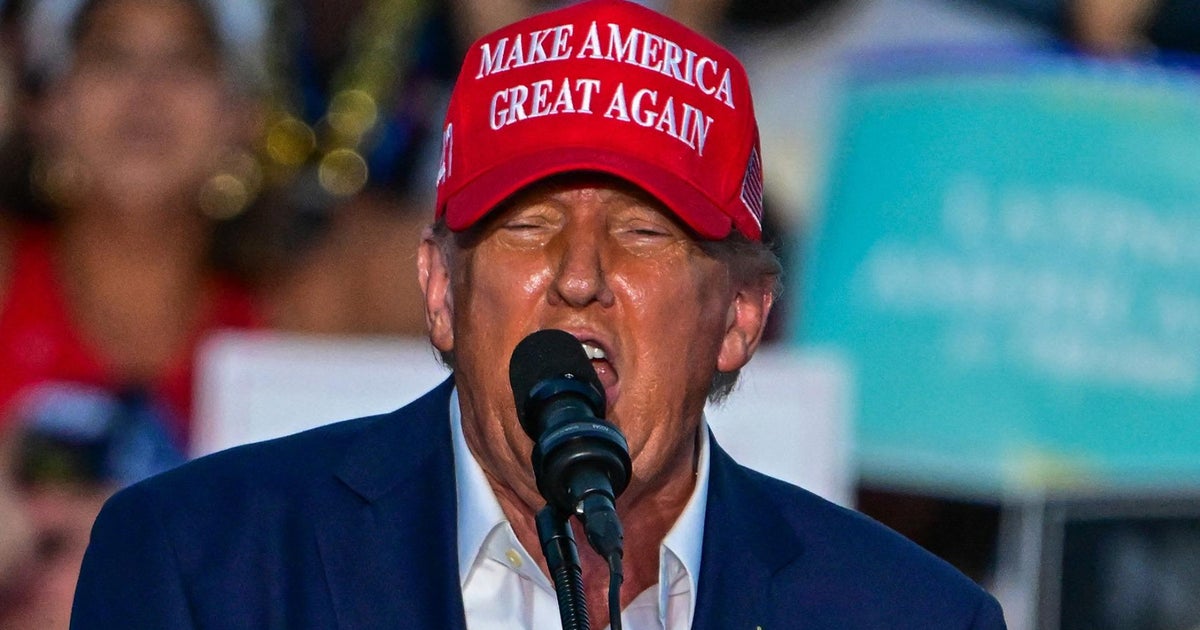 Trump goes after Biden and Harris at rally - CBS News