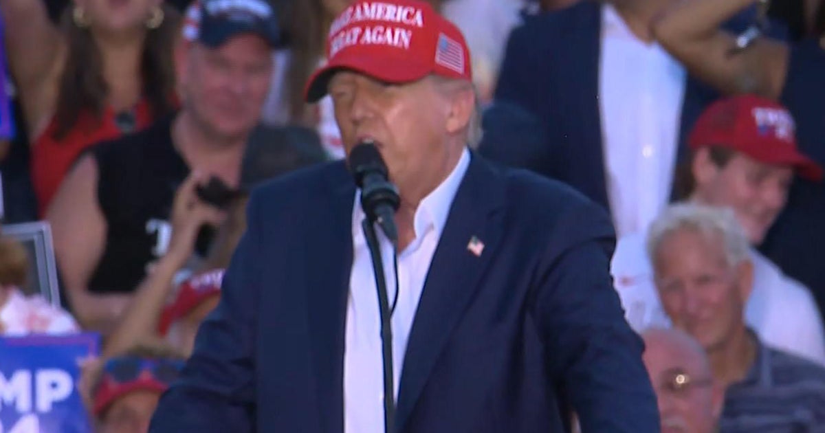Trump challenges Biden to another debate at Florida rally - CBS News