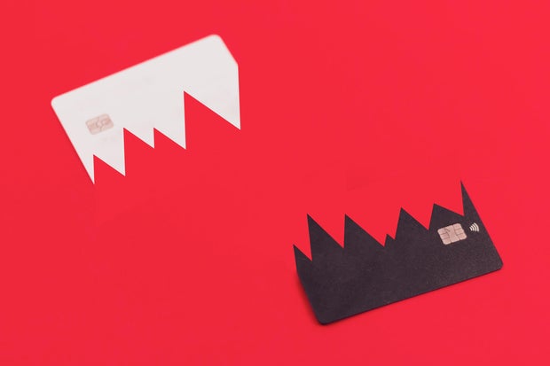 Credit cards on red background.