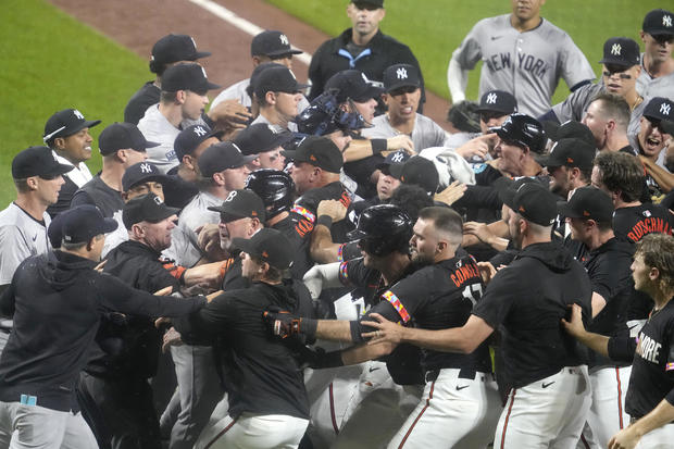 Benches clear after Heston Kjerstad #13 of the Baltimore Orioles is hit by pitch in the ninth inn during a baseball game against the New York Yankees at the Oriole Park at Camden Yards on July 12, 2024 in Baltimore, Maryland. 