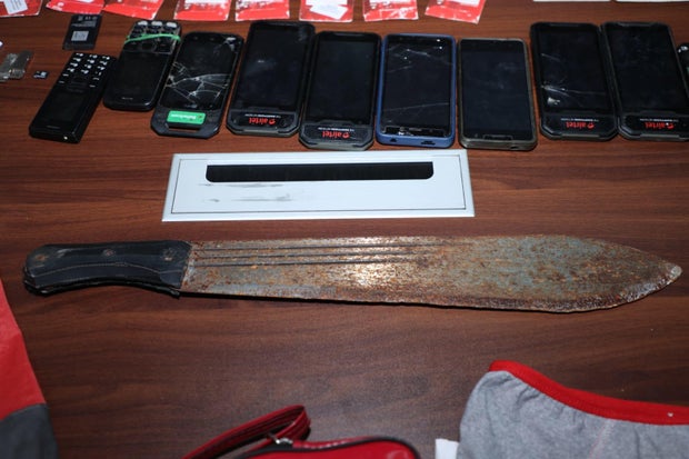A photo shared by Kenya's National Police force and its Directorate of Criminal Investigations on July 15, 2024 shows items seized by officers from a 33-year-old man identified as Collins Jumaisi Khalusha, whom they called the prime suspect in the murder of 42 women in Nairobi