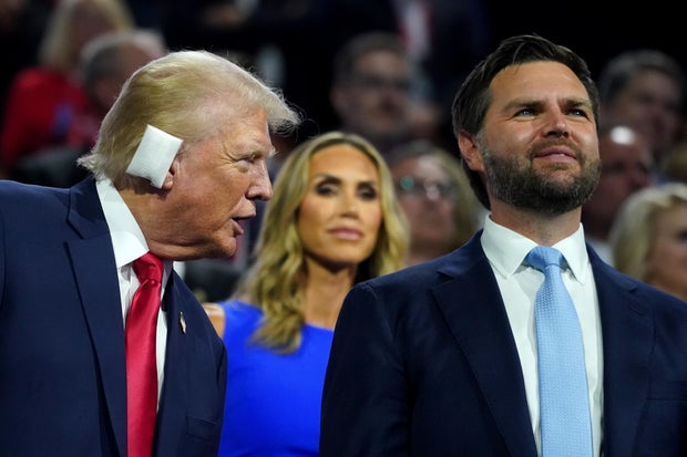 Former President Donald Trump, left, and Sen. JD Vance during the Republican National Convention at the Fiserv Forum in Milwaukee, Wisconsin, on Monday, July 15, 2024.