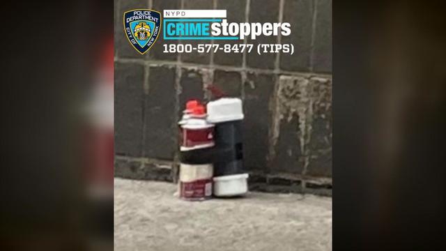 A photo of a potential explosive device outside an NYPD station house. 
