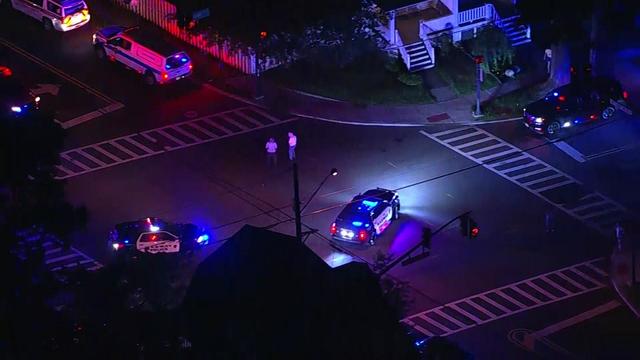 Multiple Rahway Police vehicles seen in an intersection at night. 