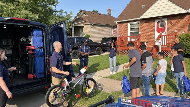 Michigan police surprise boy with new bike after it was stolen by suspect in fatal shooting of police officer 
