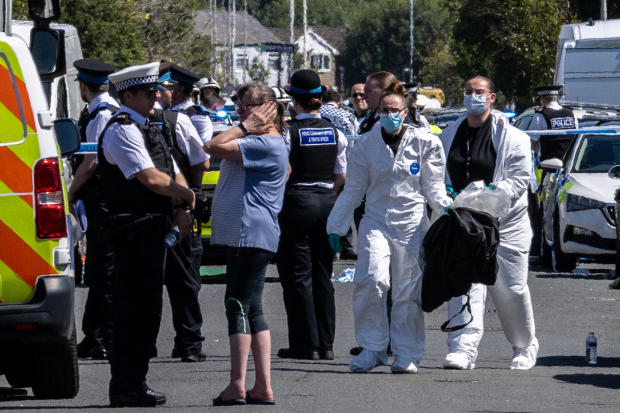 Police are seen in Southport, northwest England, after a stabbing attack, July 29, 2024. 