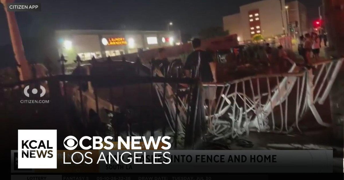 Car crashes into fence and home in South LA - CBS Los Angeles