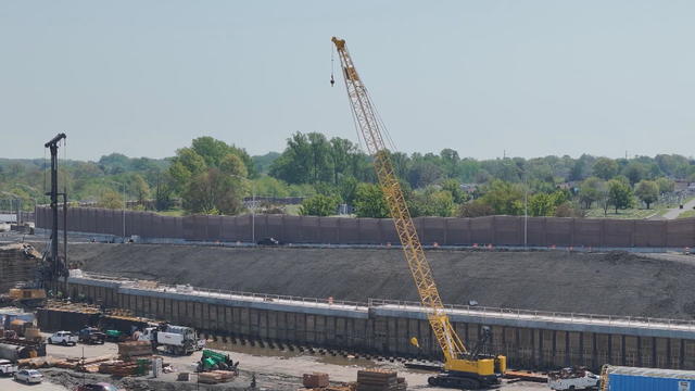 A construction site is seen near a highway 