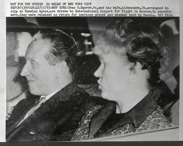 Ivan Egorov and his wife Aleksandra are driven to International Airport for their flight to Moscow on Oct. 12, 1963.