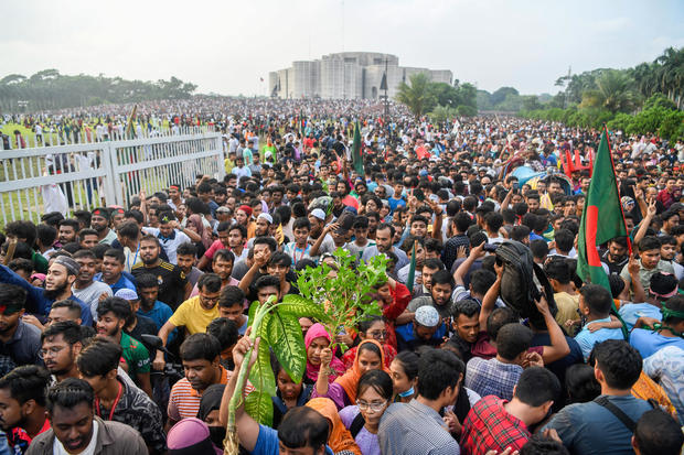 Anti-government protesters gather at the parliament house 