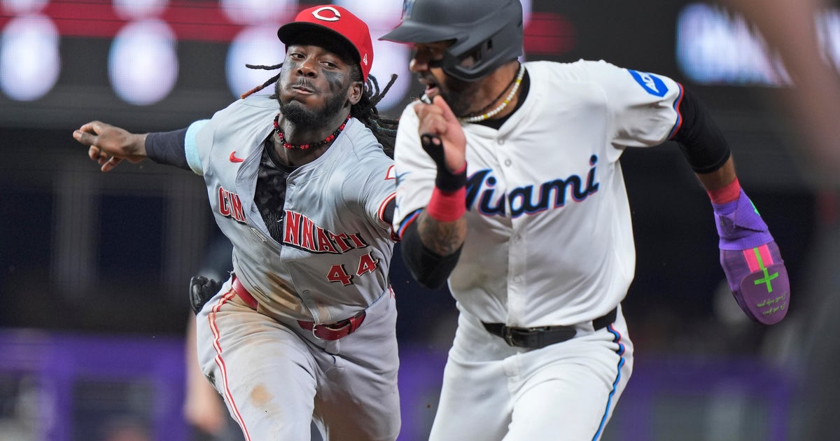Reds top Marlins 8-2 Reds top Marlins 8-2