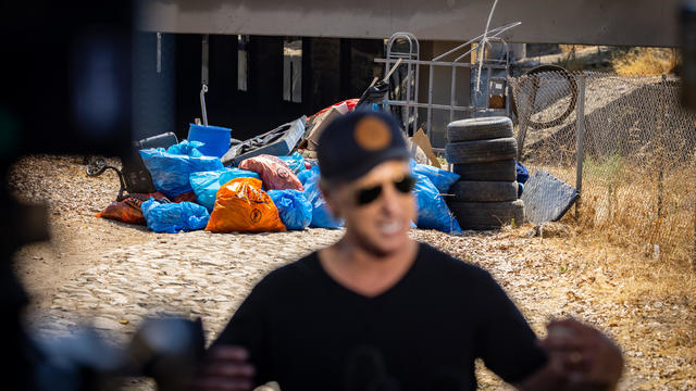 Governor Gavin Newsom along with Caltrans clean up an encampement site near Paxton Street and Remick Avenue in Los Angeles as the state's Clean California initiative continues 