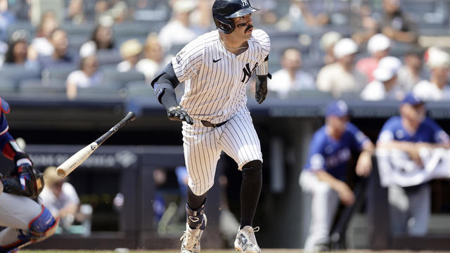 Austin Wells #28 of the New York Yankees follows through on his third inning two run double against the Texas Rangers at Yankee Stadium on August 10, 2024 in New York City. 