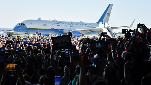 Crowd of supporters wait for a Harris-Walz campaign rally at Detroit airport 