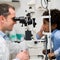 Boy getting an eye exam at the optician 